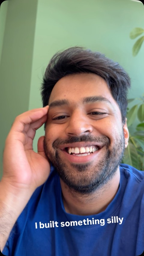 Karthik smiling, captioned “I built something silly”
