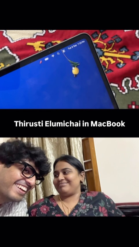 A delighted couple with the lemon charm hanging on their MacBook, captioned Thirusti Elumichai in MacBook