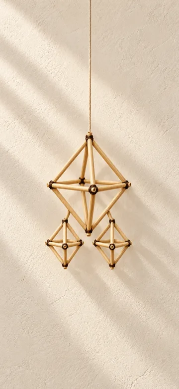 Himmeli charm on a daylight wall